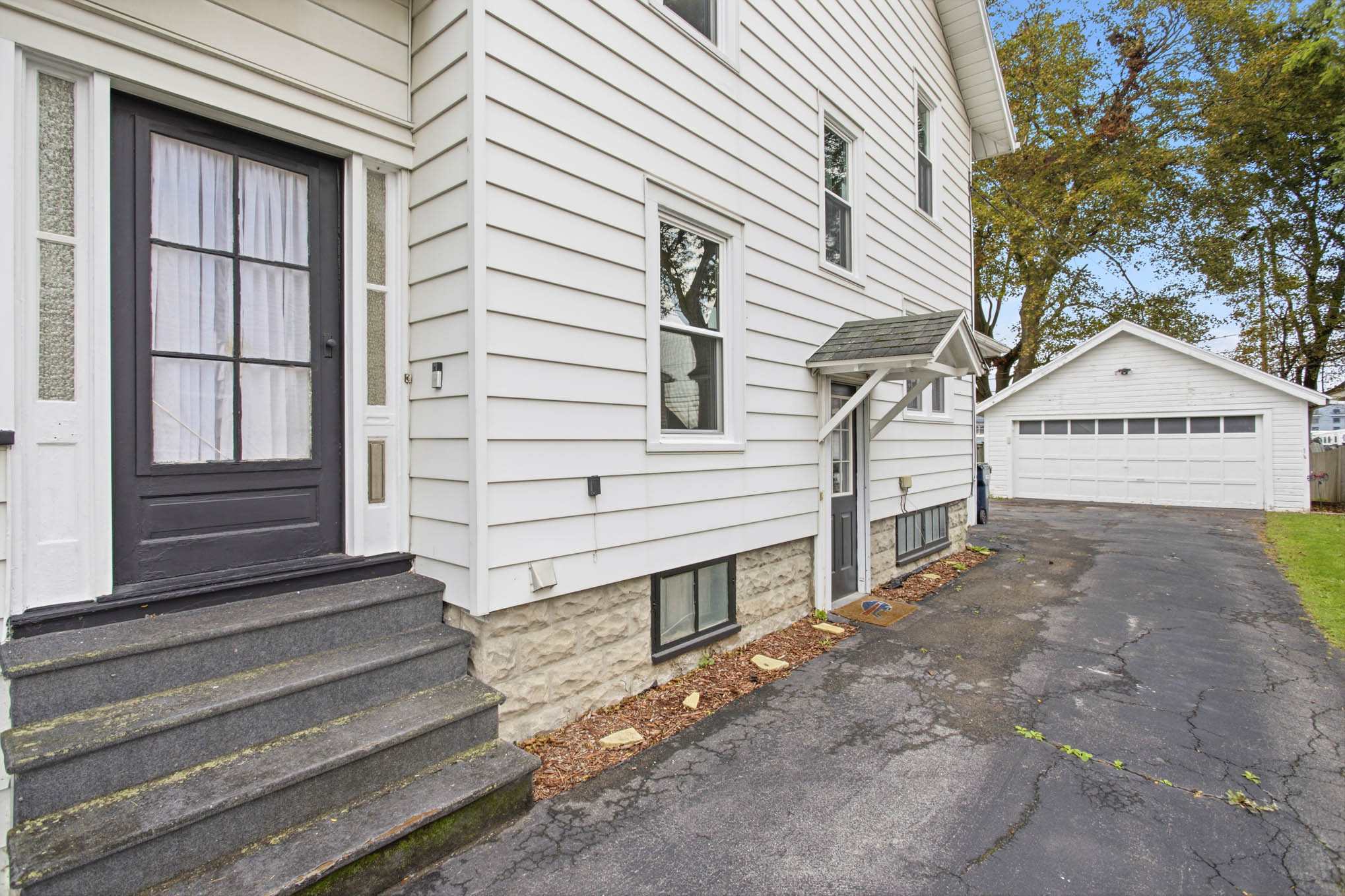 Exterior side entrance and garage