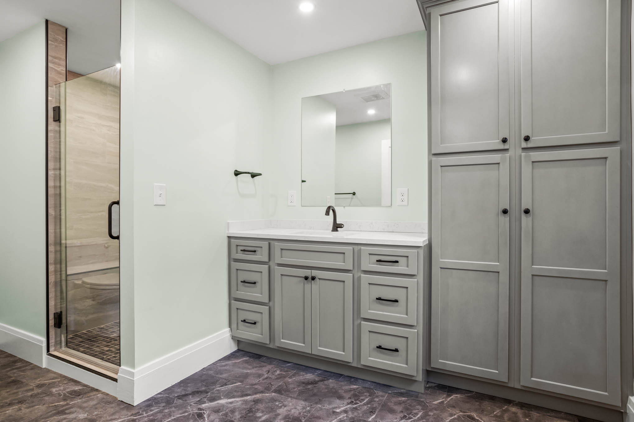 Remodeled bathroom vanity and shower