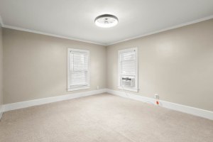 Carpeted bedroom with two windows at 52 North Lyon Street