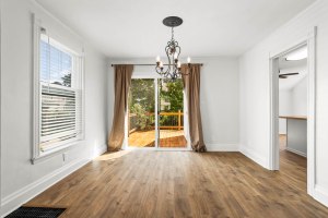 Sunlit dining room opening to the rear deck at 52 North Lyon Street