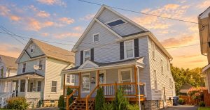 Golden-hour exterior of 52 North Lyon Street in Batavia, New York