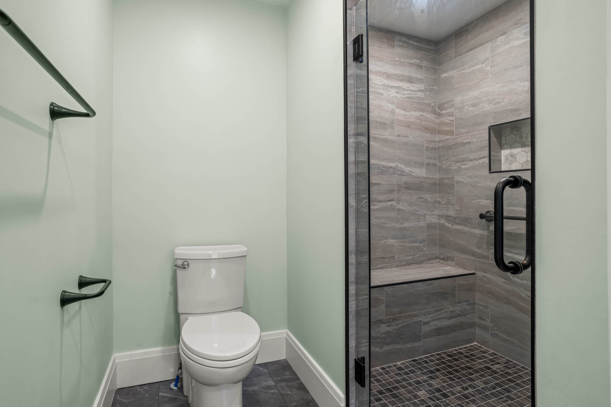Remodeled bathroom with tiled shower