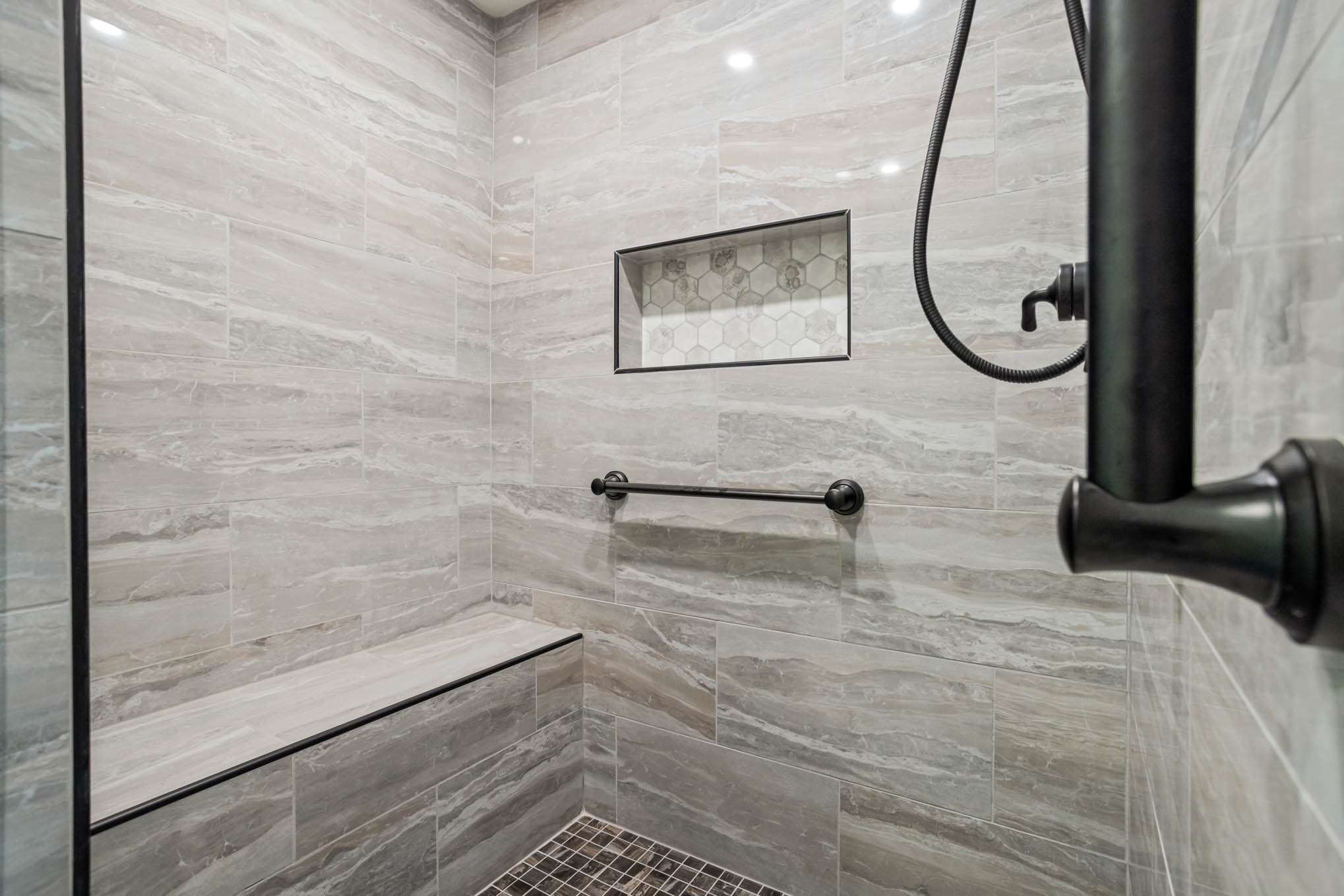 Tiled shower with built-in bench