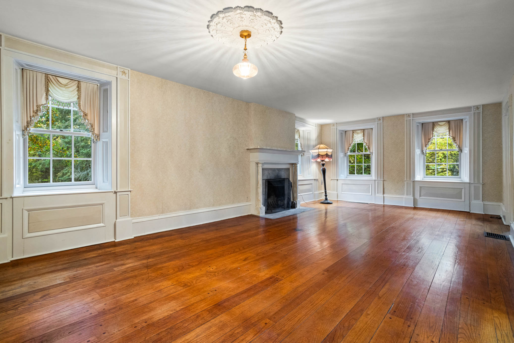 Formal living room with wood floors