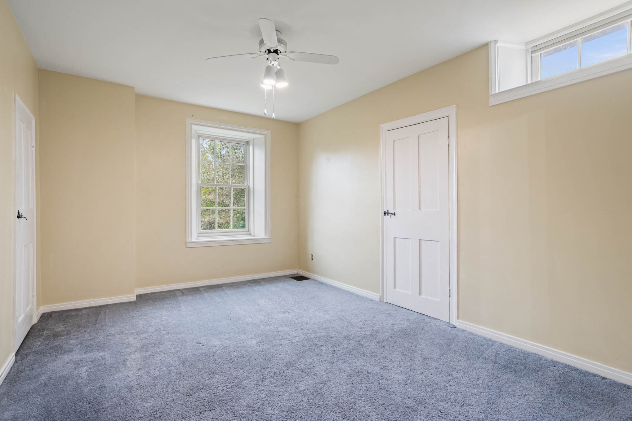 Bedroom with gray carpet