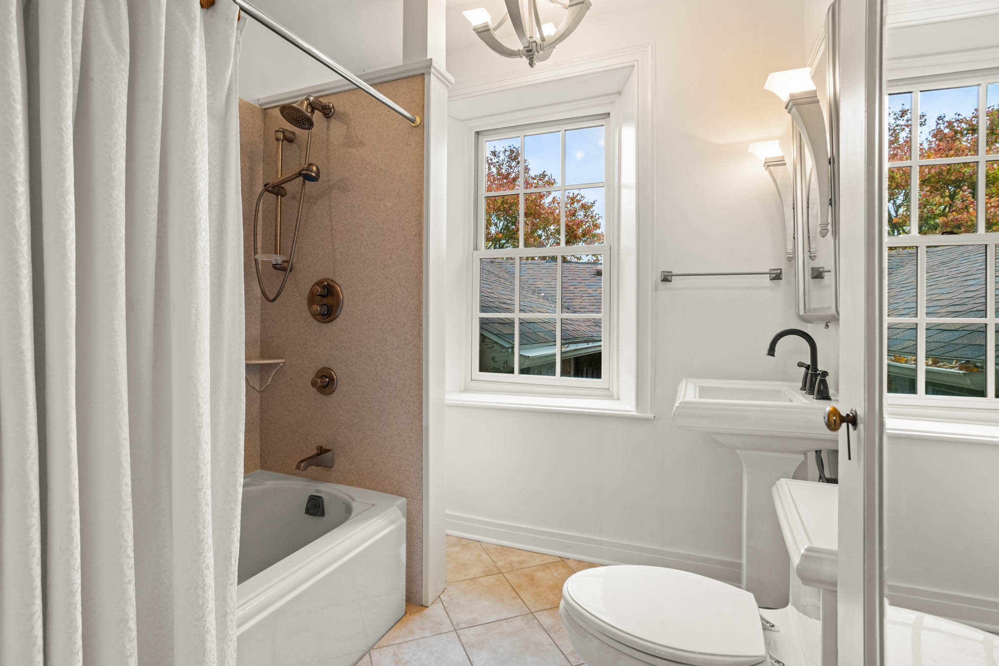 Upstairs bathroom with tub