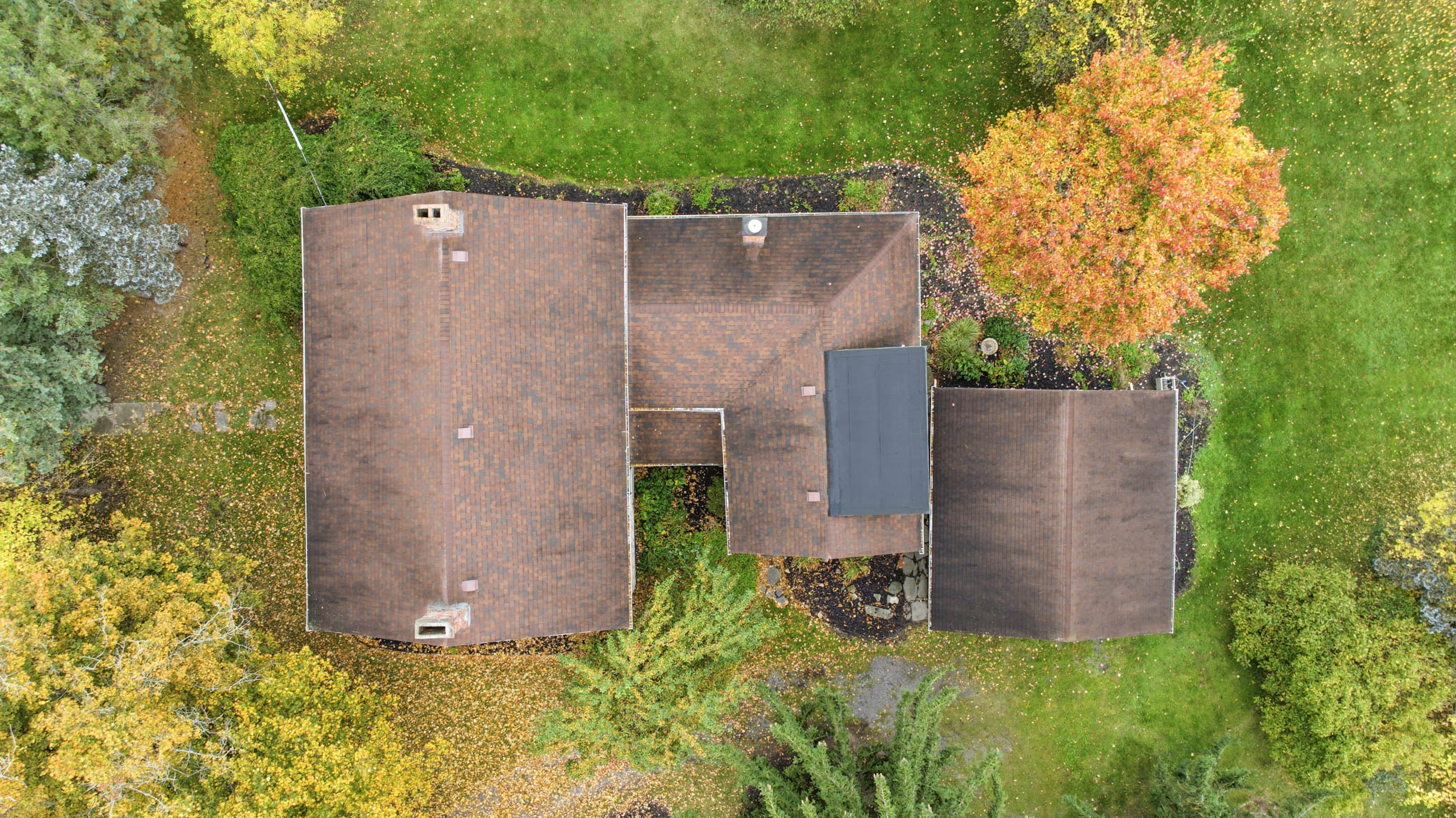 Overhead view of the home and surrounding lawn