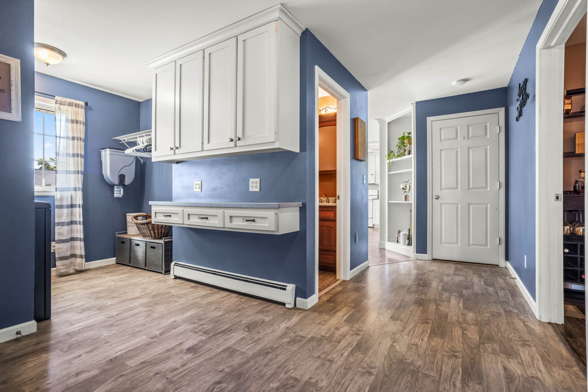 Laundry and mudroom with built-in cabinetry