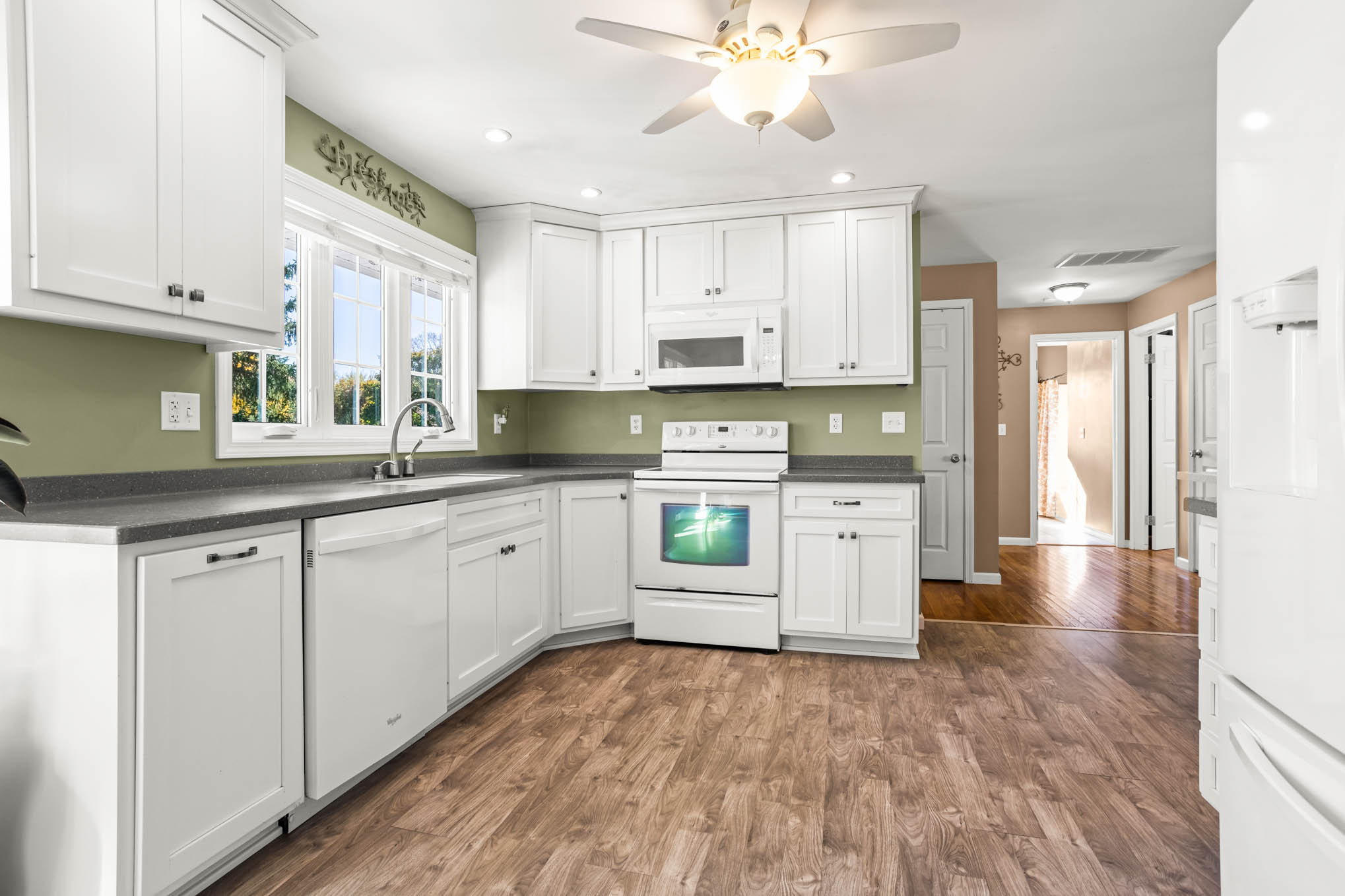 Kitchen with range and sink