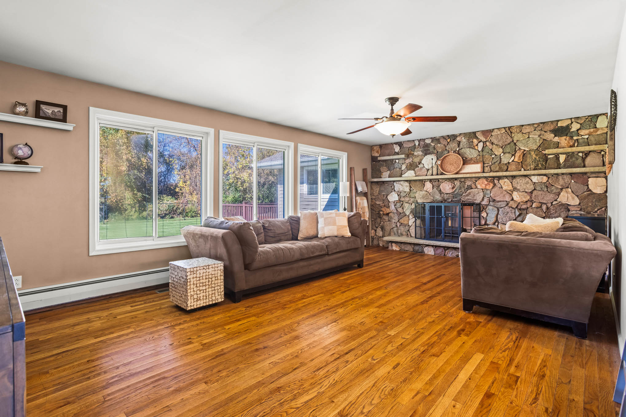 Living room with stone fireplace
