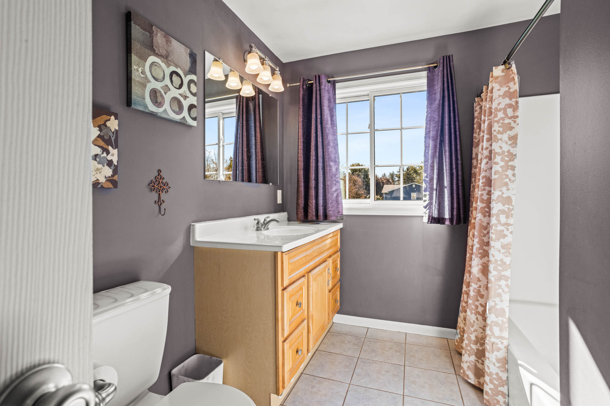 Bathroom with window and tub